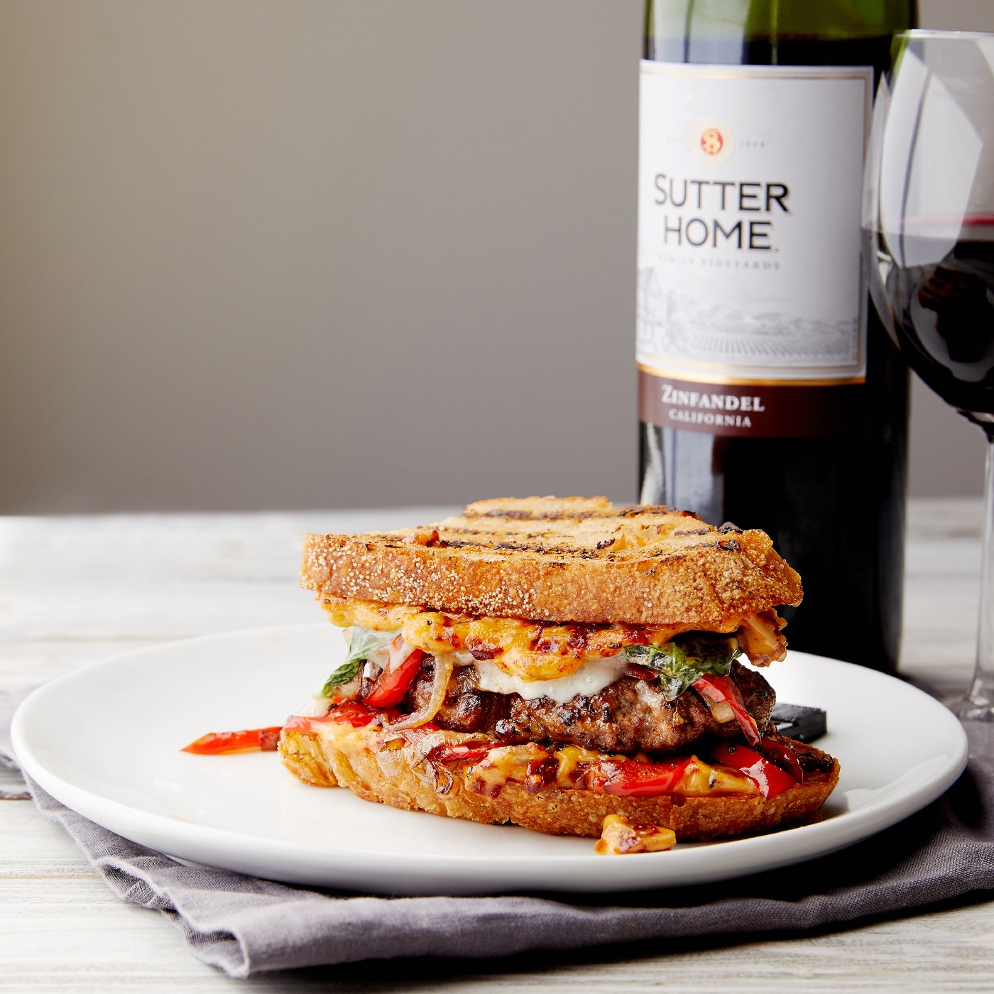 Roman Patty Melts with Balsamic Peppers and Onions and Sundried Tomato Aioli