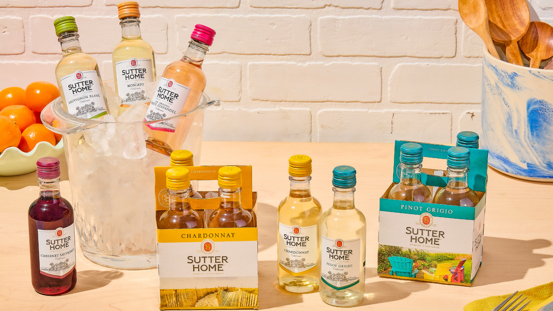 A table full of Sutter Home Mini Bottles showcasing multiple varietals